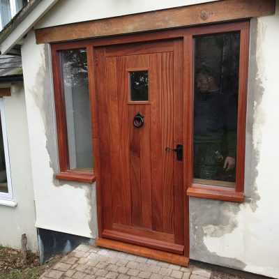 A red wood front door