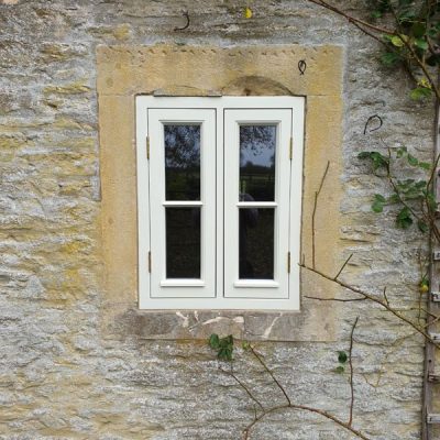 A white vertical window set, fitted for period property renovation
