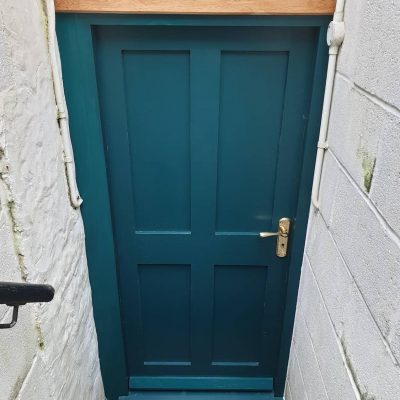 A modern blue front door